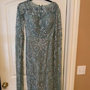 blue long sleeve beaded evening gown